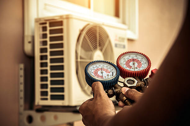 Professional Hvac technician working in Miamitown, OH